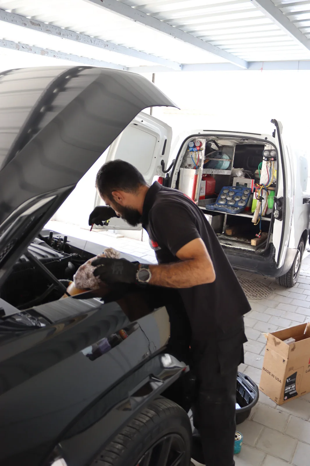 Mobile Car Battery Qatar technician performing Weak Battery on-site